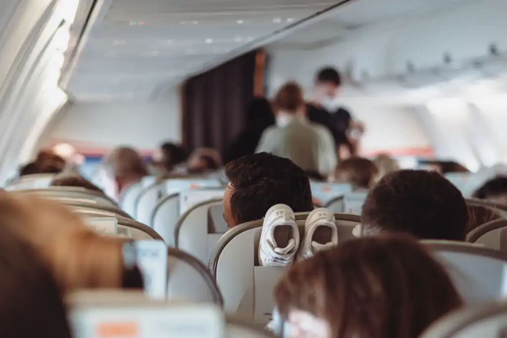 Stowing shoes on the back of the seat is bad etiquette
