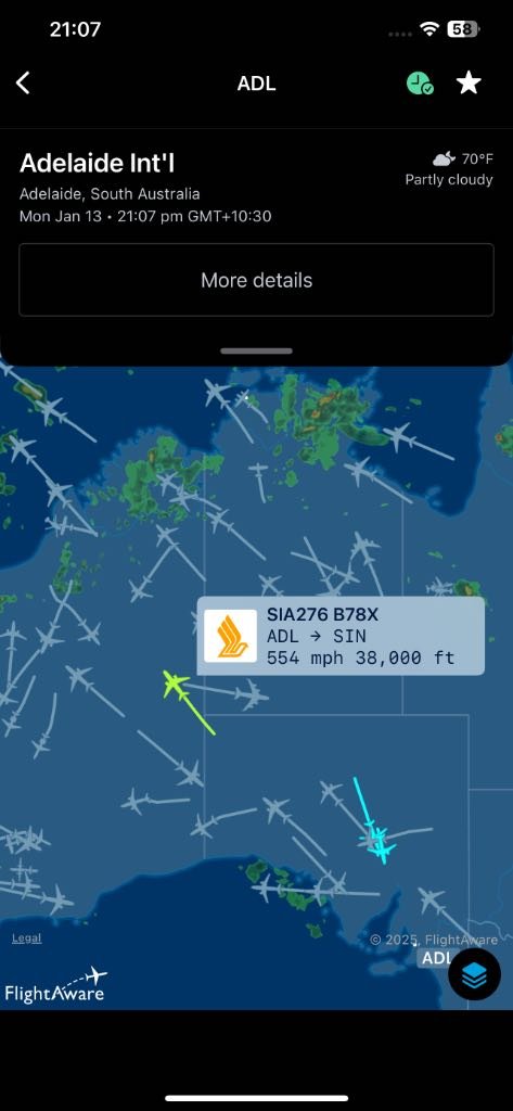Screenshot of FlightAware with flightpath and weather over Australia (iPhone)