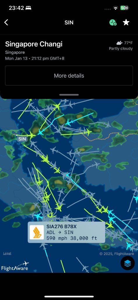 Screenshot of FlightAware with flightpath and weather over Indonesia (iPhone)