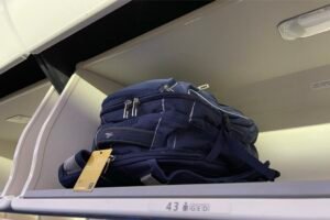 Backpack in an overhead bin on a Boeing 787-10