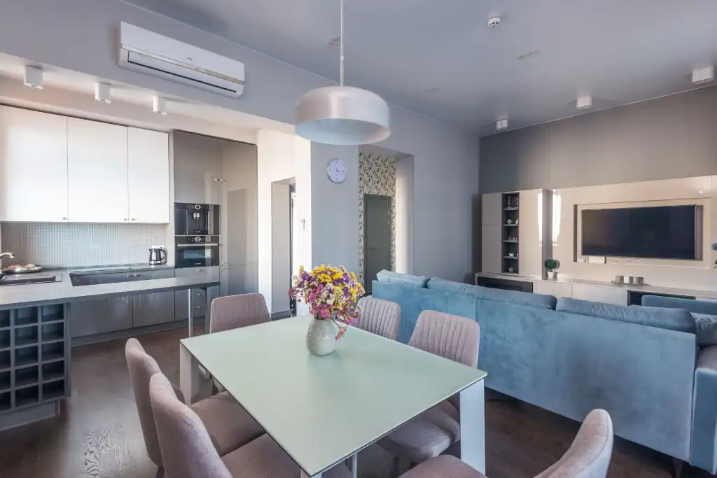 Wall mounted split system air conditioning system in kitchen dining area