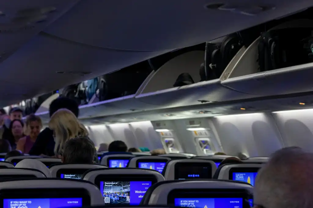 Boarding and stowing carry-ons in overhead bins